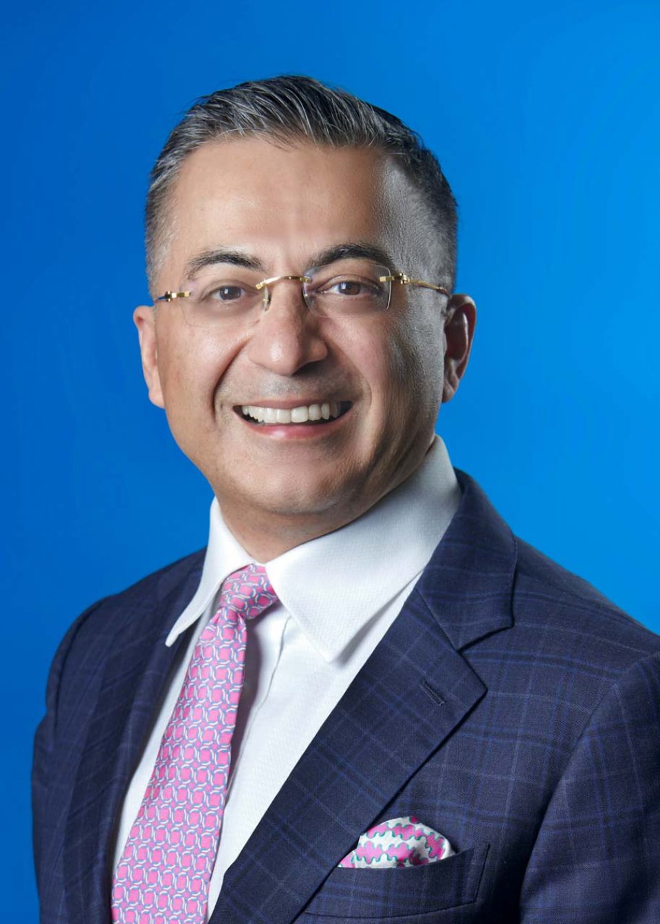 Coloured corporate headshots for senior executives by professional corporate photographer