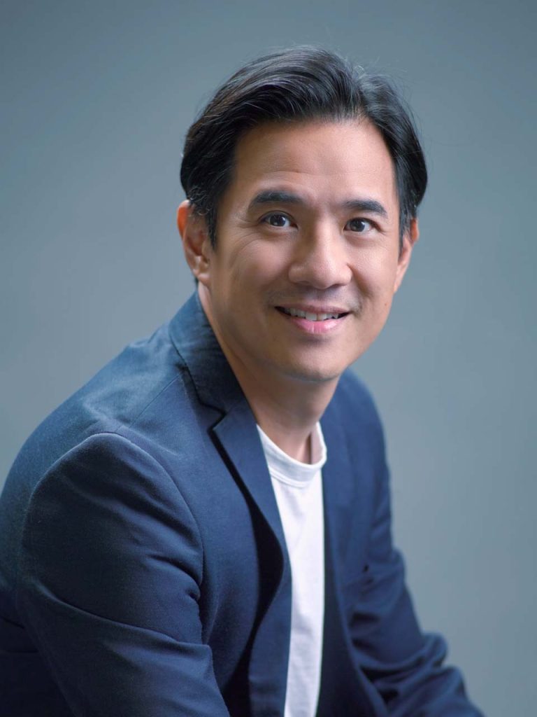 Corporate headshot of Christopher Ho of Warner Bros. Discovery — studio portrait photographer singapore, corporate headshot singapore