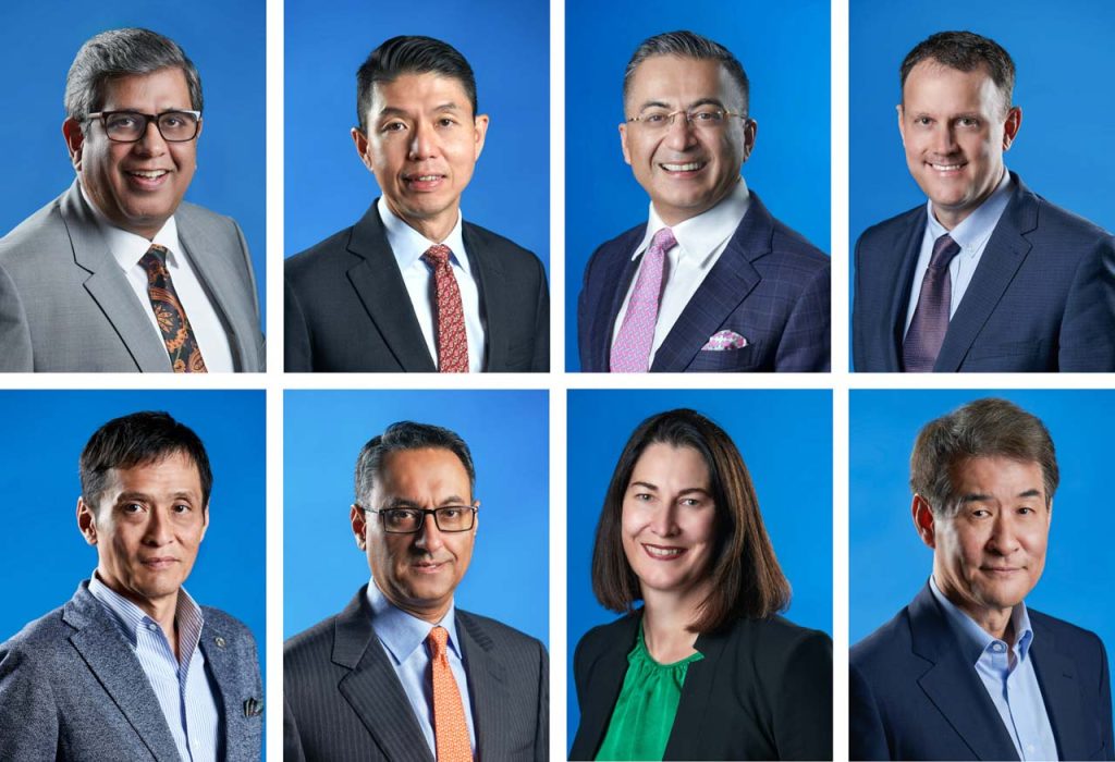 Set of eight matched corporate headshots of Dell Technologies Asia Pacific Japan leaders on a blue background — corporate headshot singapore