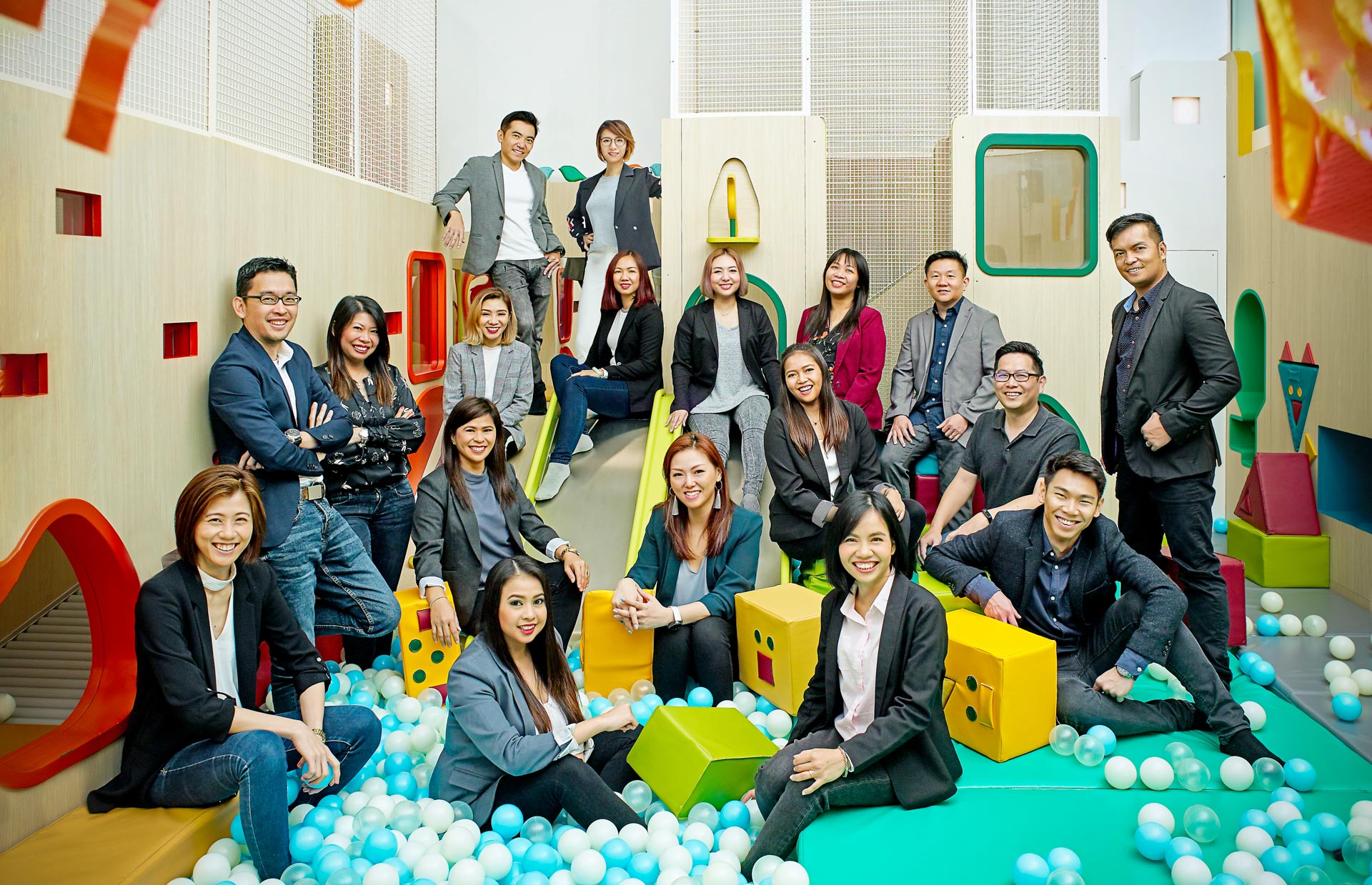 Stylish corporate group portraits that break free from the conventional approach of lining up teams in stiff, monotonous rows