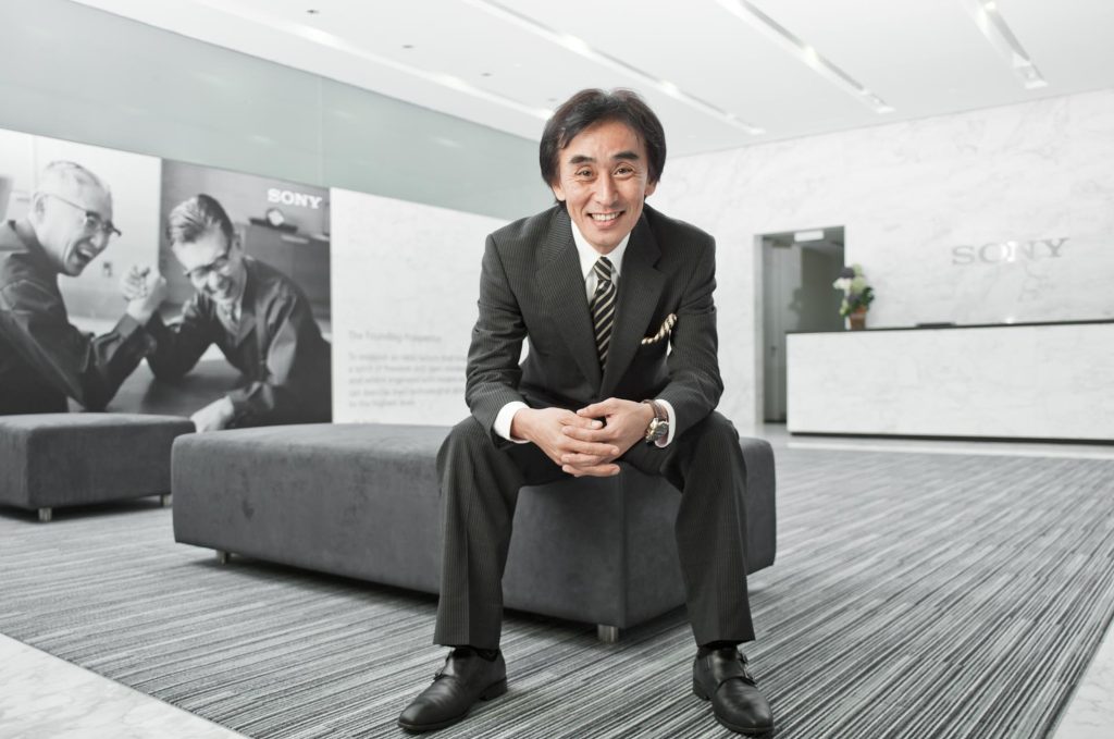 Sony Managing Director seated in a design-led office interior lined with monochrome photographs — singapore corporate portrait photography, corporate portrait photographer singapore