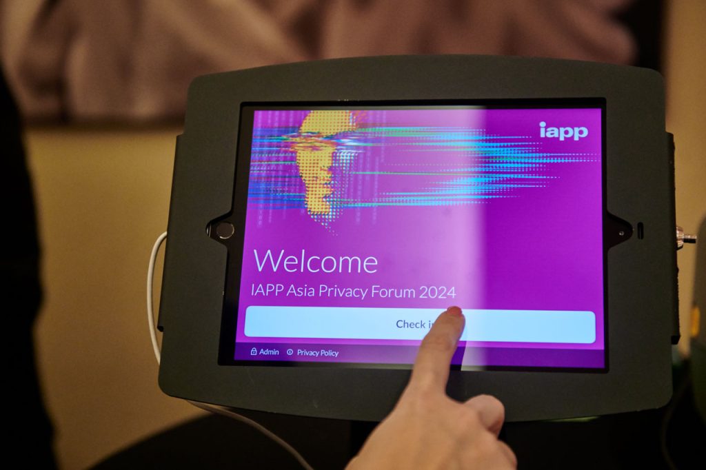 Delegate using the self check-in kiosk at the IAPP Asia Privacy Forum 2024