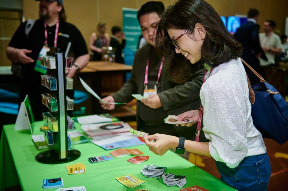 Delegates working through materials at a workshop table at the IAPP Asia Privacy Forum 2024 — singapore corporate events photographer, conference photography singapore