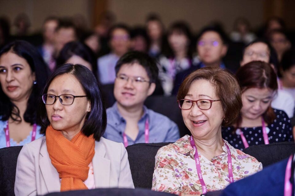 Delegates smiling in the audience at the IAPP Asia Privacy Forum 2024 — singapore corporate events photographer, professional corporate events photography singapore