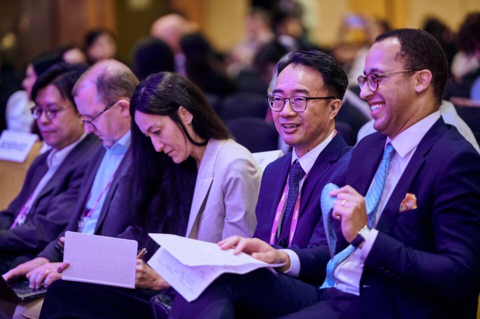 Delegates seated with conference materials at the IAPP Asia Privacy Forum 2024 — singapore corporate events photographer, professional corporate events photography singapore