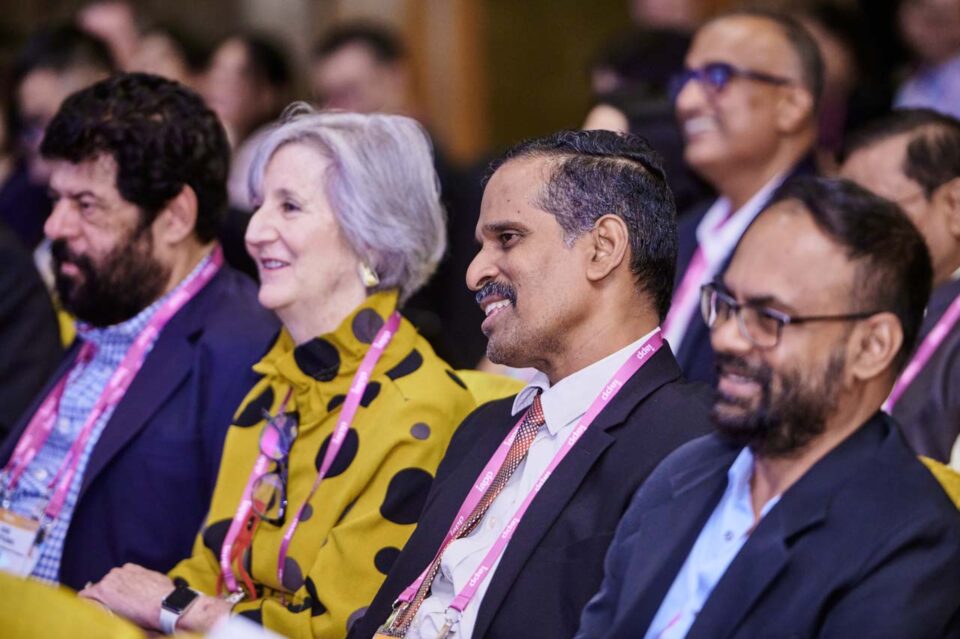 Delegates in conversation around a table at the IAPP Asia Privacy Forum 2024 — singapore corporate events photographer, professional corporate events photography singapore
