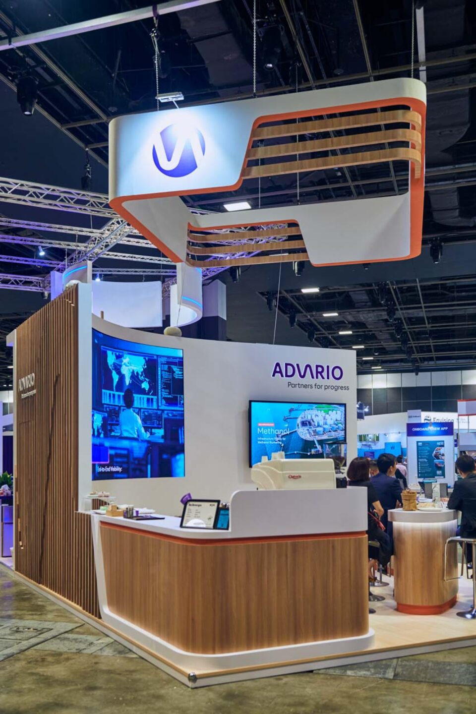 Advario exhibition stand with presentation screens at Singapore Maritime Week — singapore corporate events photographer, professional corporate events photography singapore