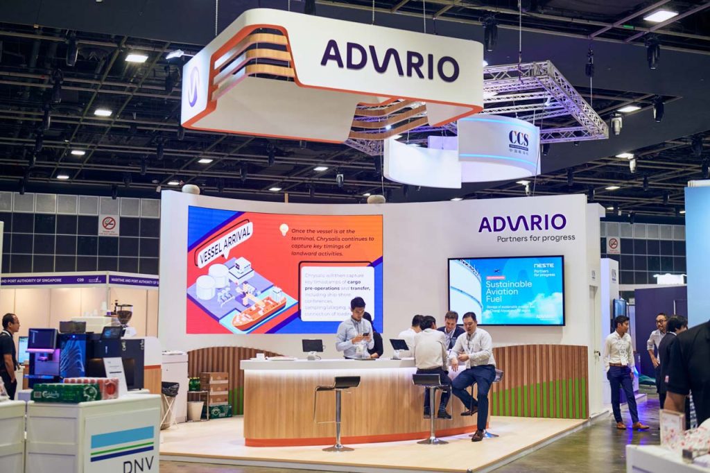 Advario stand with brochures and screens at Singapore Maritime Week