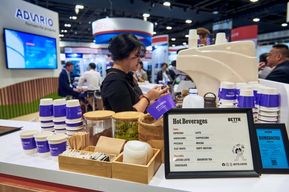 Refreshment counter with branded cups and menu board at Singapore Maritime Week — singapore corporate events photographer, professional corporate events photography singapore