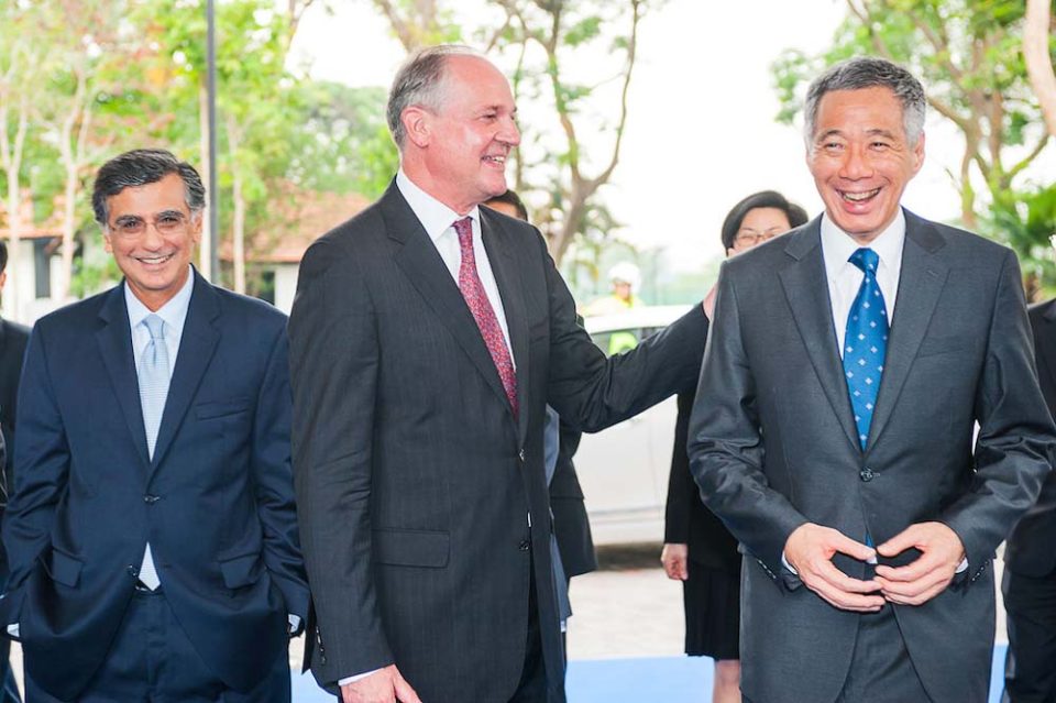 Guest of honour greeting executives at the official opening of Unilever Four Acres Singapore — singapore corporate events photographer, conference photography singapore
