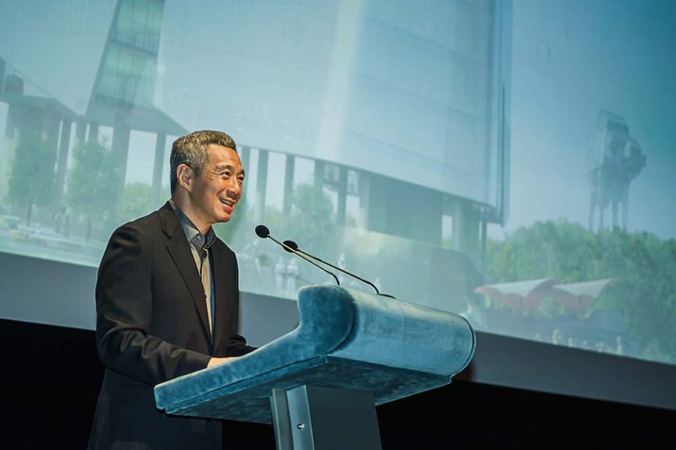 Speaker addressing the audience at the 2014 Lucasfilm Sandcrawler official opening — singapore corporate events photographer, professional corporate events photography singapore