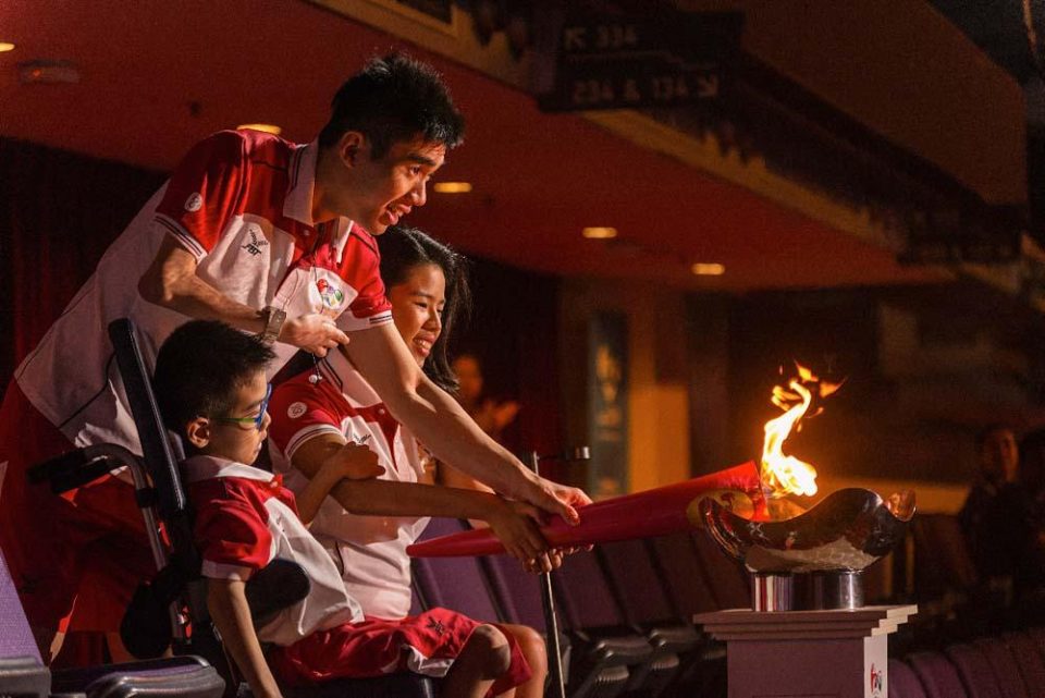 Performer in red costume with a flame during the 2015 ASEAN Para Games opening ceremony — singapore corporate events photographer, professional corporate events photography singapore