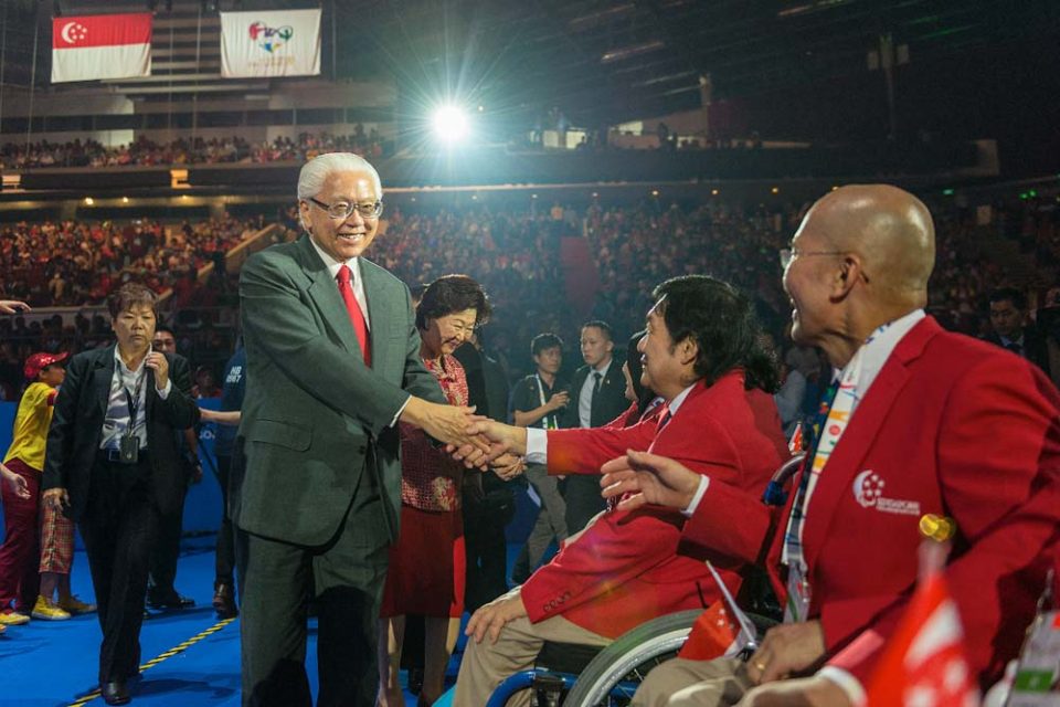 Officials and athletes in the stands at the 2015 ASEAN Para Games opening ceremony — singapore corporate events photographer, professional corporate events photography singapore