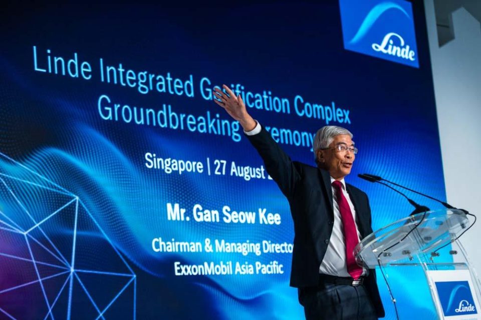 Speaker at the lectern beside the Linde Integrated Gasification Complex groundbreaking screen — singapore commercial photographer, corporate photographer singapore