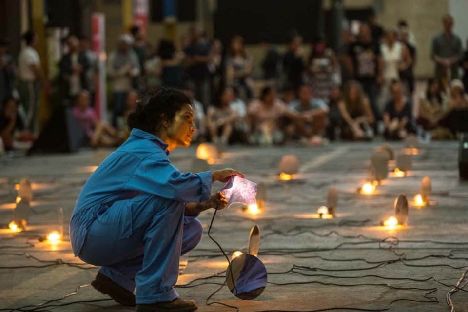 Participant arranging candles on the floor during the Buy Singlit 2020 literary event — singapore corporate events photographer, professional corporate events photography singapore
