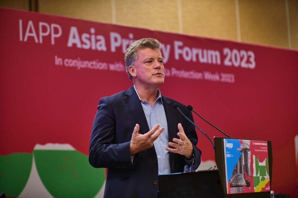 Speaker presenting on stage at the IAPP Asia Privacy Forum 2023 in Singapore — singapore corporate events photographer, professional corporate events photography singapore