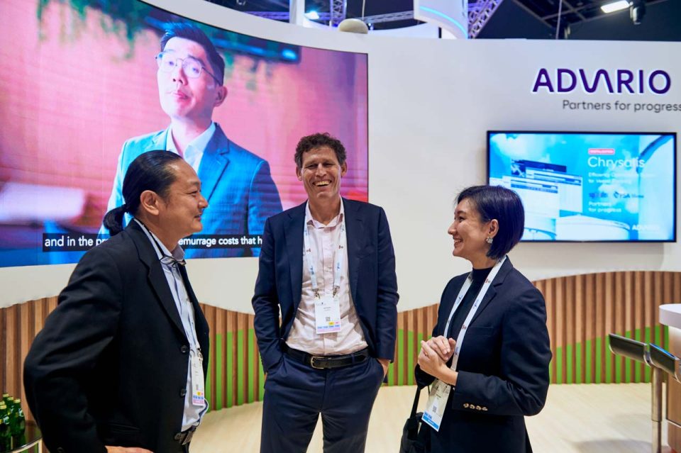Speaker addressing guests at the Advario stand during Singapore Maritime Week 2024 — singapore corporate events photographer, professional corporate events photography singapore