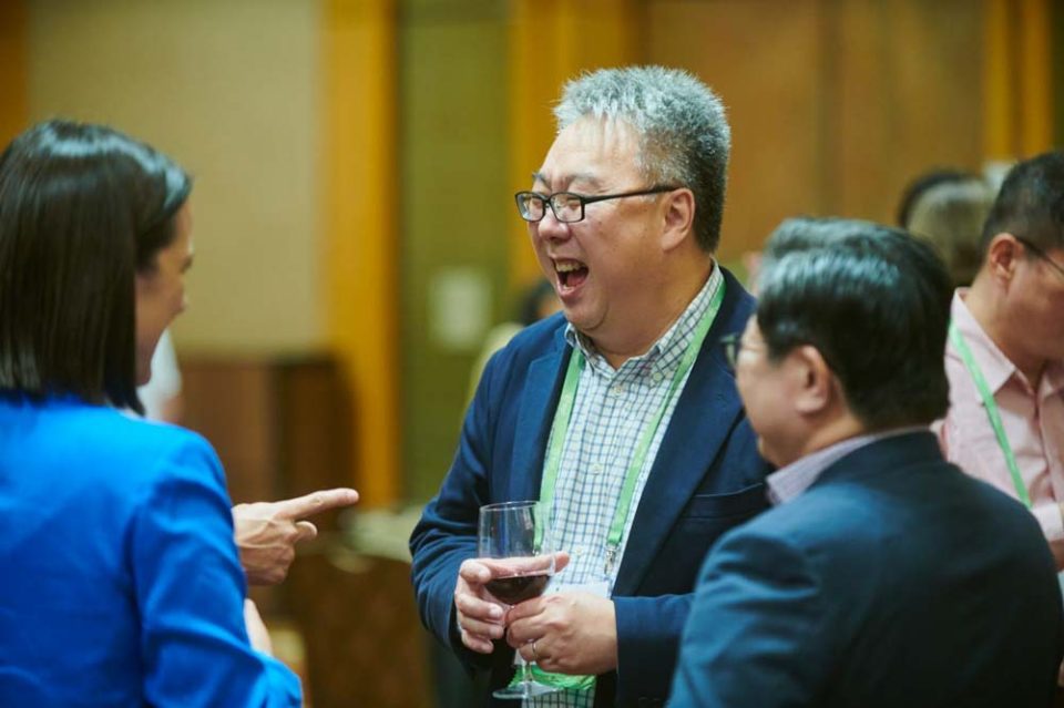 Delegate speaking from the floor during a question session at the IAPP Asia Privacy Forum — singapore corporate events photographer, professional corporate events photography singapore