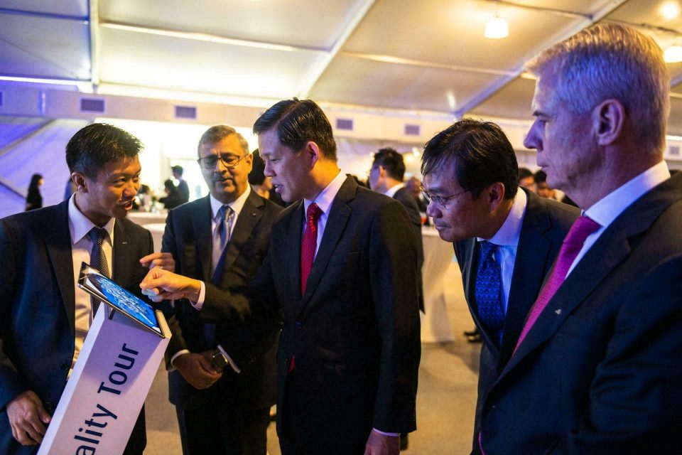 Guests in business dress networking at a Linde corporate event in Singapore — singapore corporate events photographer, professional corporate events photography singapore