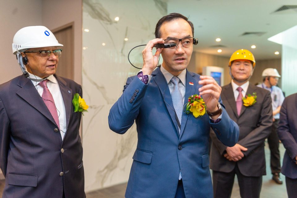 Guests in hard hats at the Makino groundbreaking ceremony in Singapore — singapore corporate events photographer, professional corporate events photography singapore