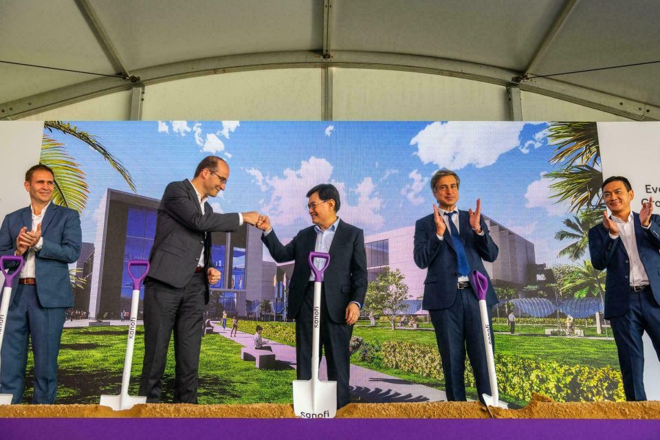 Speaker addressing guests under a marquee at a Sanofi outdoor event in Singapore — singapore corporate events photographer, professional corporate events photography singapore